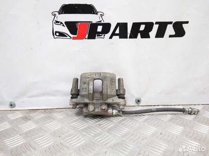 Суппорт задний левый Mitsubishi Lancer 10