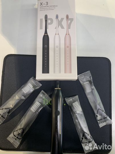 Электрическая зубная щетка новая