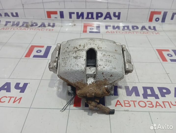 Суппорт тормозной передний правый Volkswagen Passat CC 1K0615124E