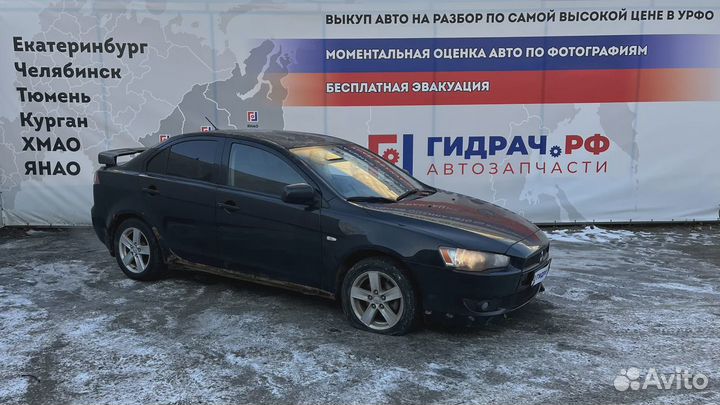 Накладка под торпедо правая Mitsubishi Lancer X 8006A064