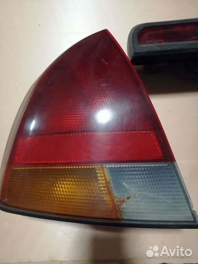Фонарь задний левый Митсубиси каризма