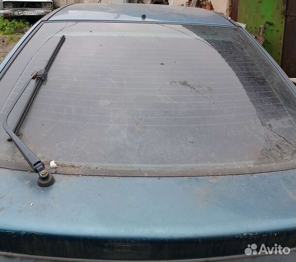 Заднее стекло Renault laguna