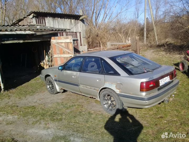 Бампер мазда 626 GD 1990г