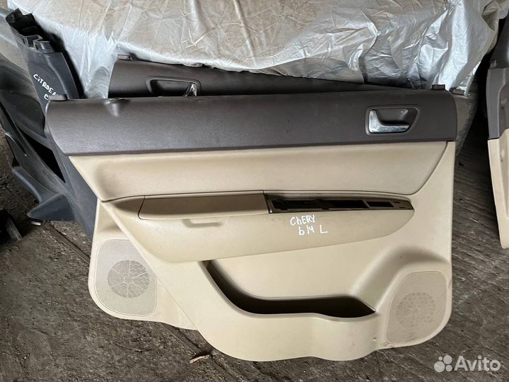 Карта двери обшивка багажника крыльев Chery b14