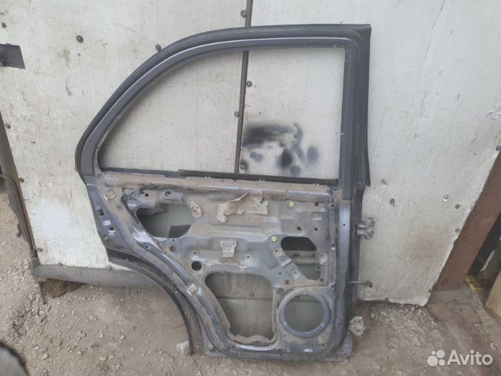 Дверь задняя левая Kia Sorento BL D4CB 2003