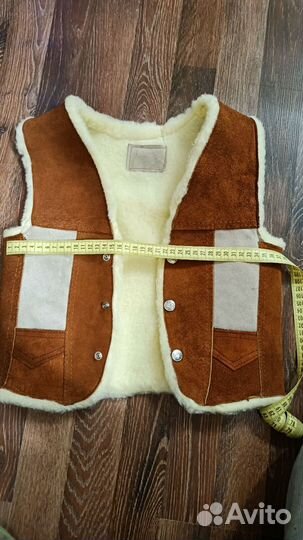 Меховая жилетка