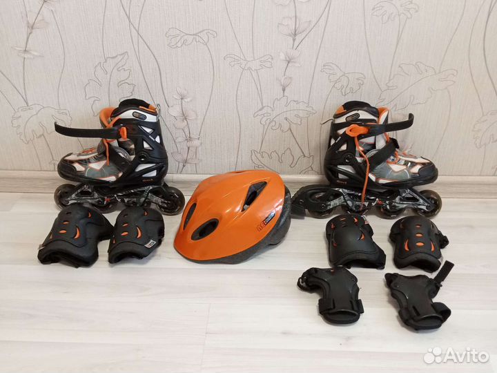 Роликовые коньки