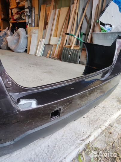 Задний бампер Subaru Outback 4 B14 57704AJ020