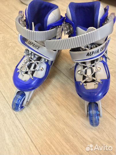 Роликовые коньки