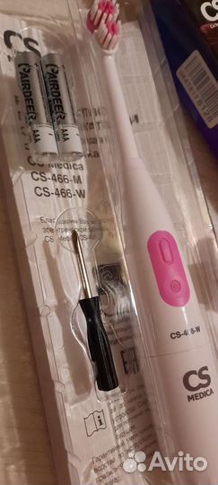 Электрическая зубная щетка