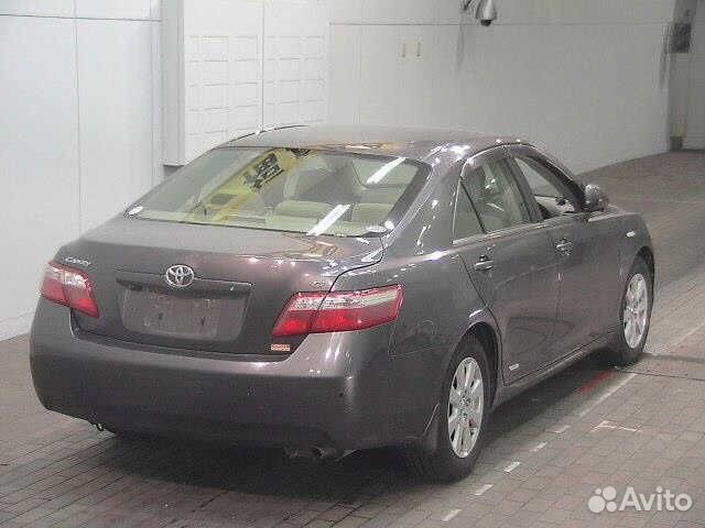 Тросик ручного тормоза центральный Toyota Camry