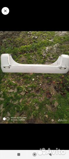 Бампер Mazda Demio