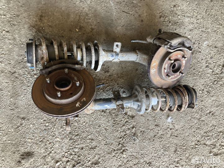 Передние стойки ford escort 92 год