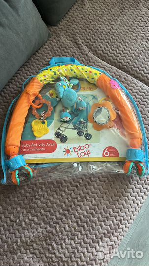 Дуга с игрушками