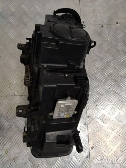 Фара биксеноновая левая Bmw X5 3.0D