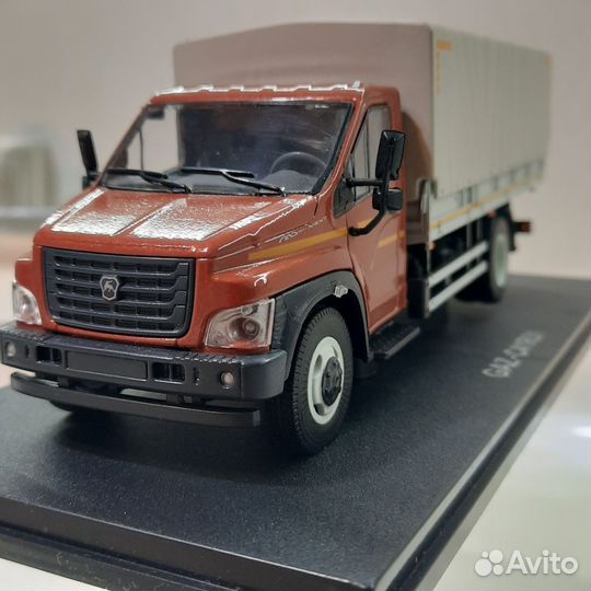 Модель автомобиля Газон Next 1:43