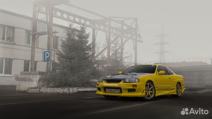 Передний бампер C-West на Nissan Skyline R34