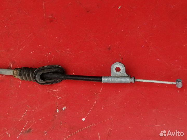 Трос стояночного тормоза левый Nissan Teana J32