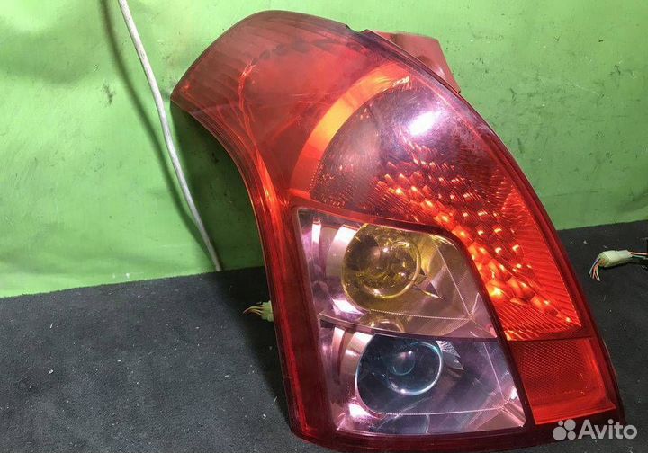 Фонарь задний левый Suzuki Swift 3 2004-2010