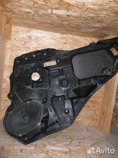 Обшивка двери Mazda 6gg