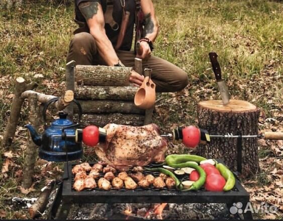 Гриль на огне с вертелем