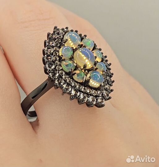 Бронь Серебряное кольцо с природными опалами