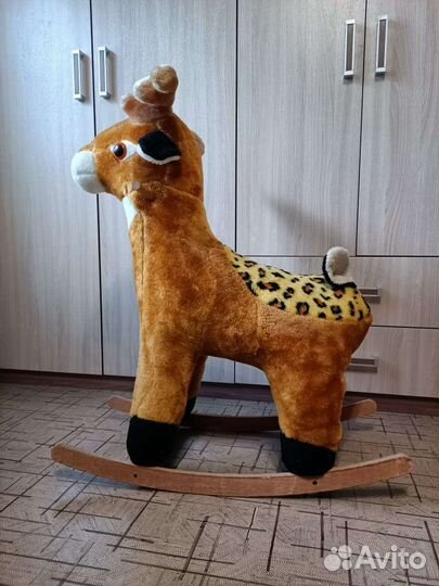 Детская игрушка качалка