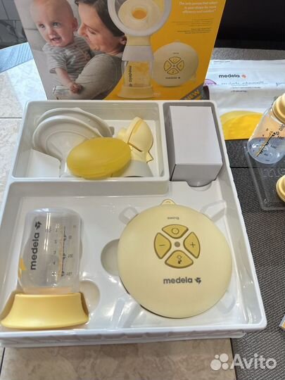 Молокоотсос medela swing flex