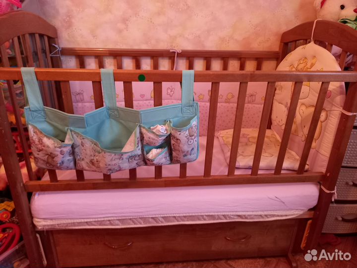 Детская кроватка с выдвижным ящиком