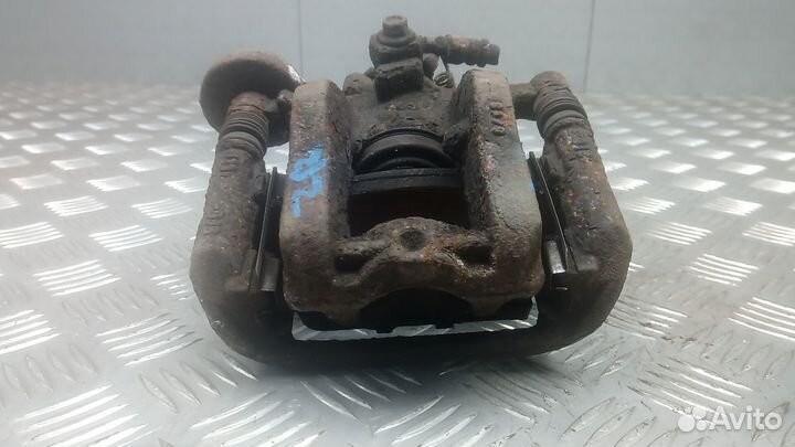 Суппорт задний правый Opel Zafira C