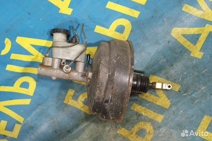 Вакуумник гтц Nissan Almera n16