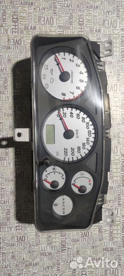 Приборная панель Mitsubishi Lancer 9