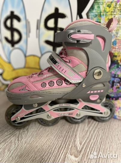 Роликовые коньки