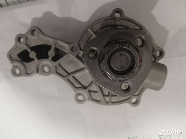 Водяной насос на Пассат B5 VAG 026 121 005F