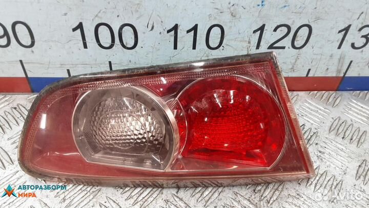 Фонарь крышки багажника левый Mitsubishi Lancer 10