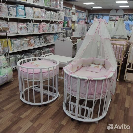 Детская кроватка с маятником круглая