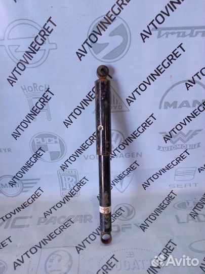 Стойка амортизатор задняя Mitsubishi L200