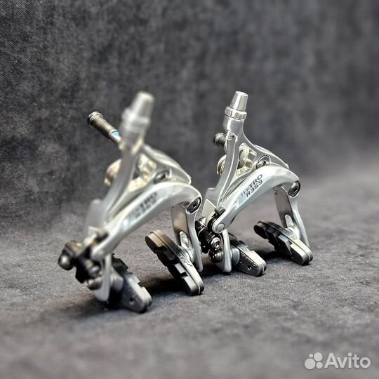 Комплект клещевых тормозов (передний и задний) Tek