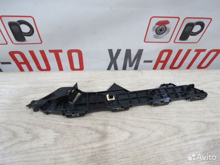 Кронштейн заднего бампера левый Toyota Corolla 150