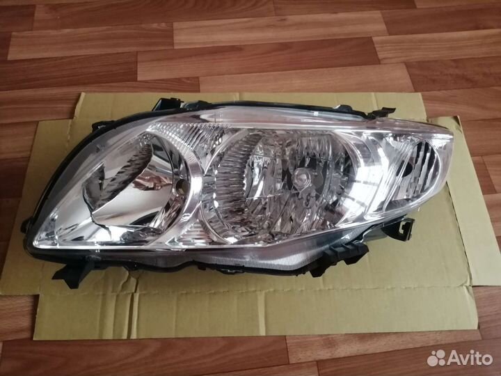 Фара левая Toyota Corolla 150