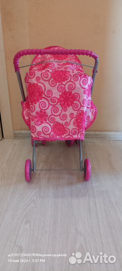 Коляска кукольная