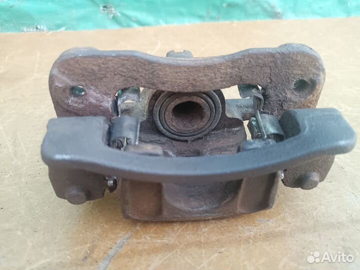 Суппорт задний левый Kia Cerato 2008-2013 г