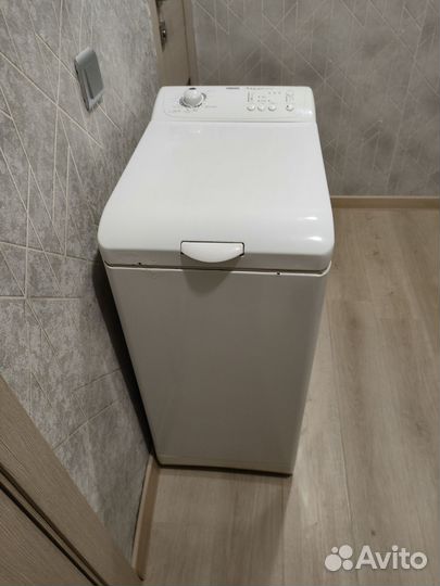 Стиральная машина с вертикальной загрузкой