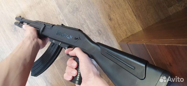 Игрушечный автомат с пульками