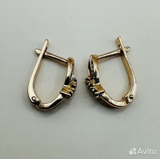 Золотые серьги с бриллиантами и изумрудами