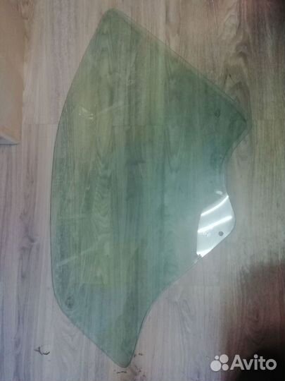 Стекло двери передней левой Рено Логан Renault