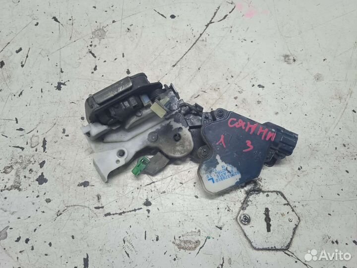 Замок двери левый задний Nissan Sunny Ниссан Санни