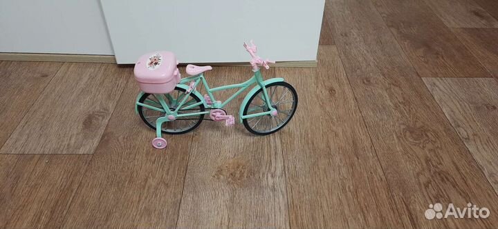 Игрушечный велосипед для кукол