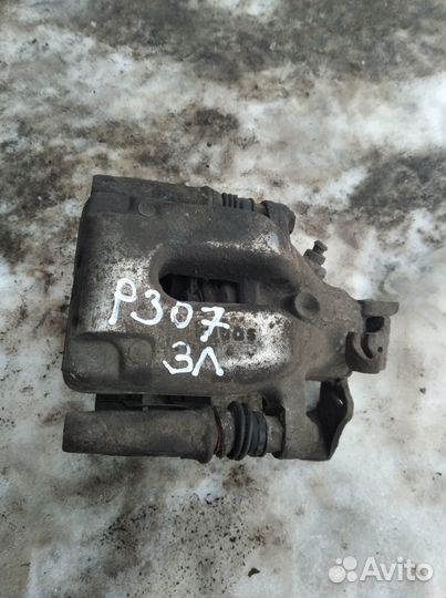 Суппорт задний левый Пежо 307/308