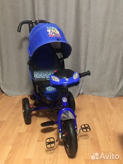 Детский трехколесный велосипед с ручкой